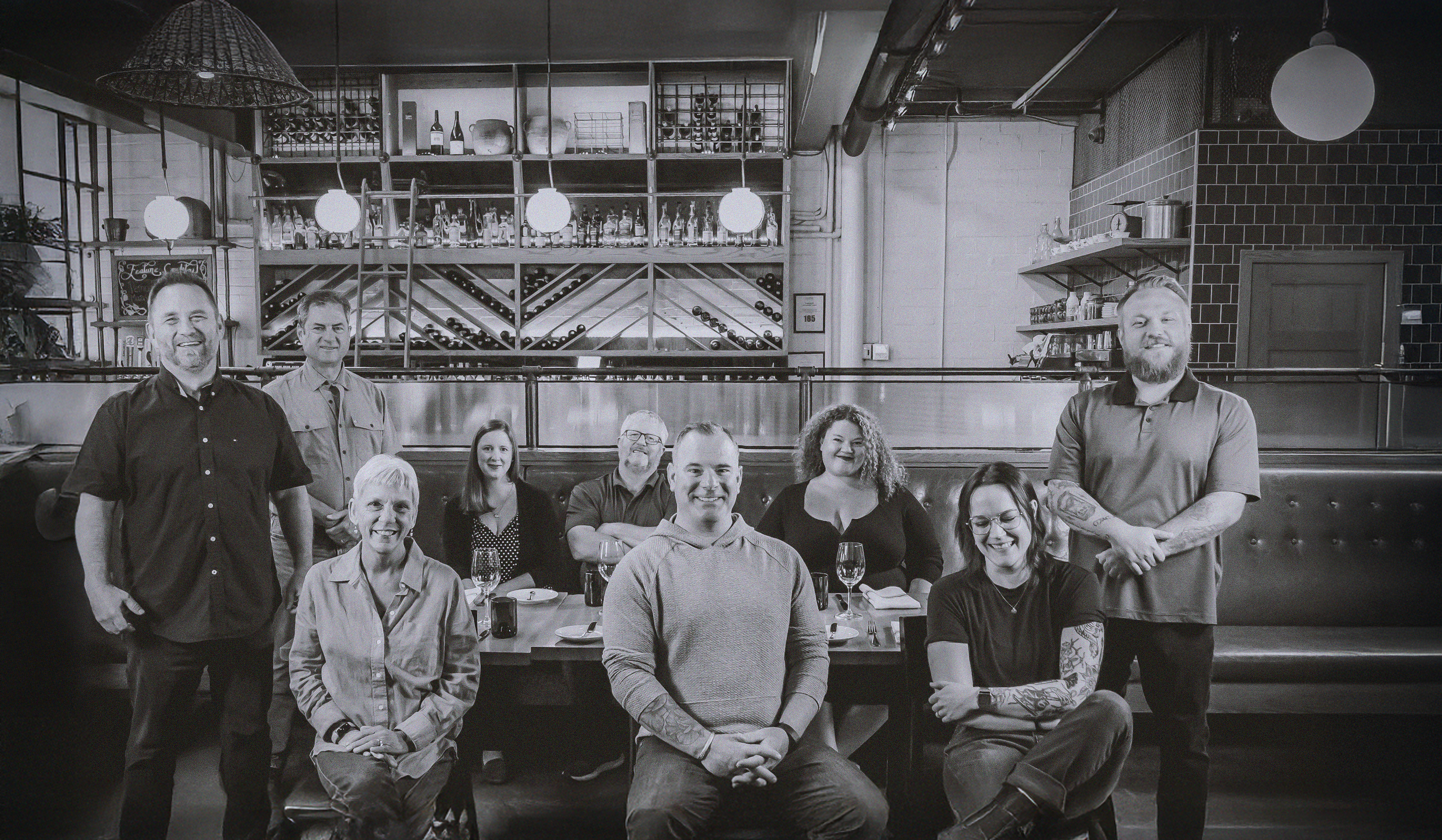 Group of RYCO Employees posing for a photo in the dining room of The Halifax Brasserie